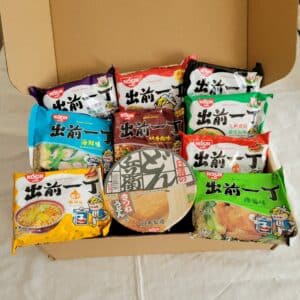 Asian Hong Kong Nissin Instant Noodles Snack Box – 7 packets plus 1 cup of  Nissin Top Selling Ramen Mystery Surprise Box, Gift Box - Agritz